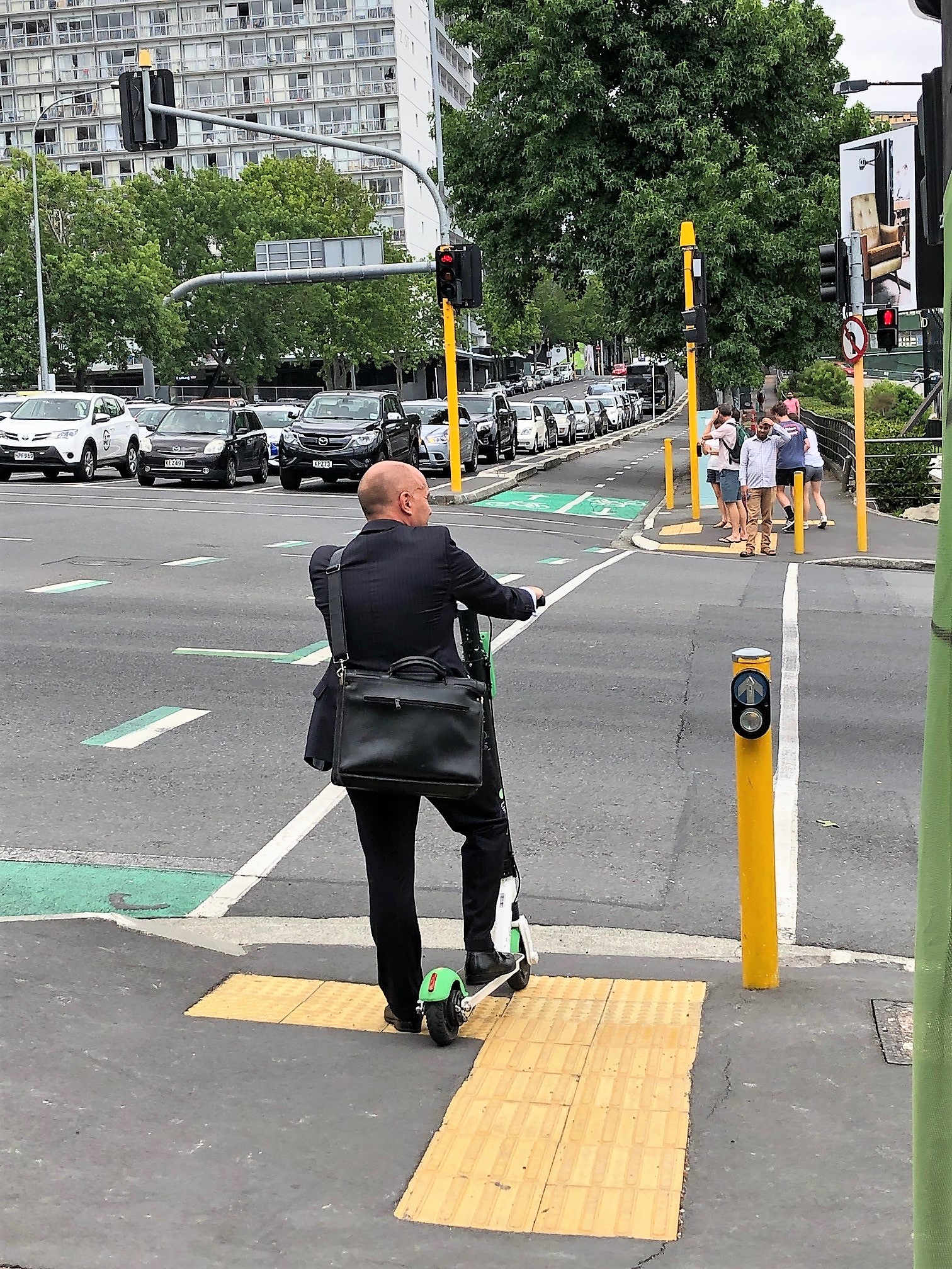 Auckland_guy_on_scooter_(2).jpg